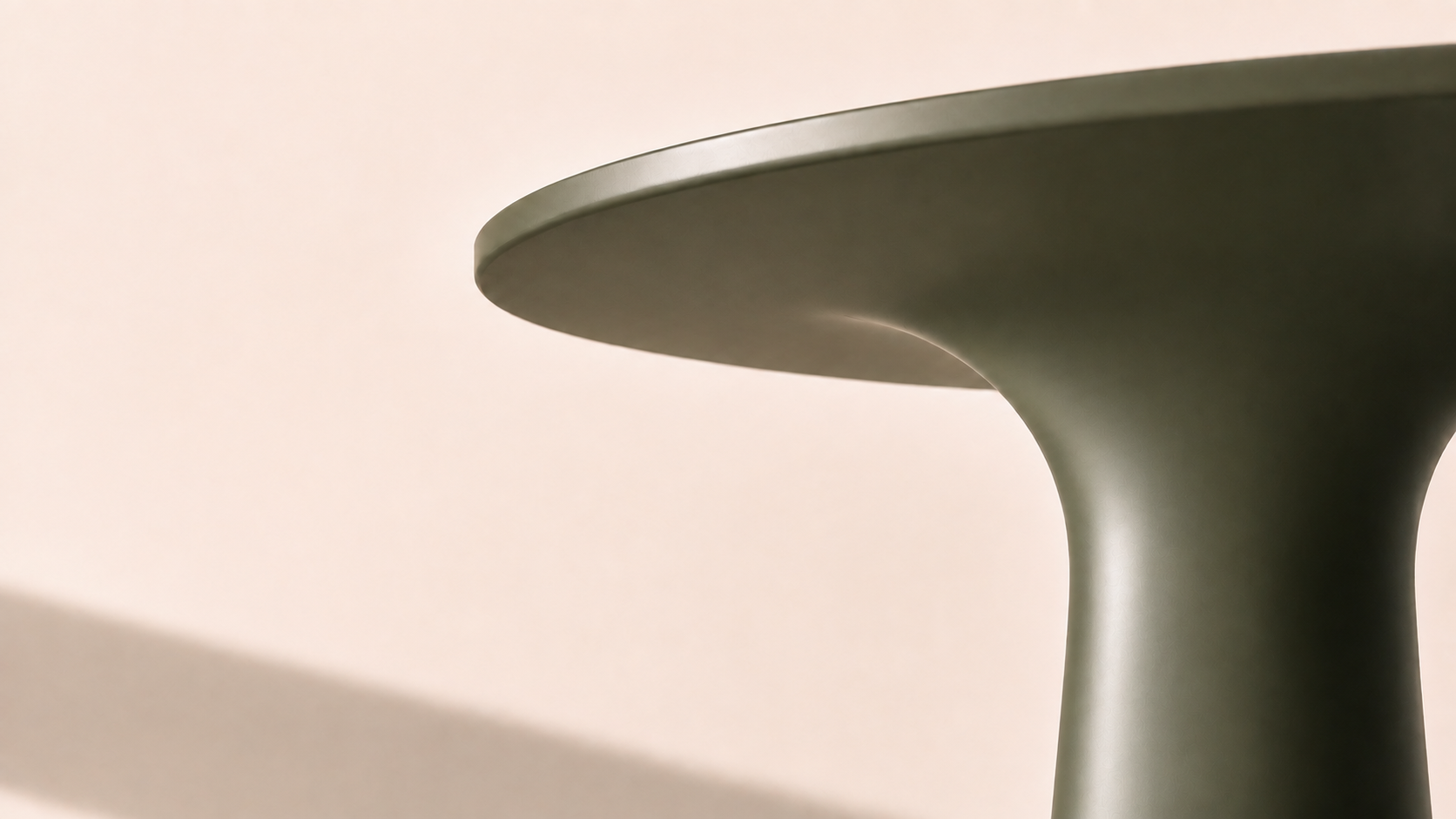 Olive table surface flowing into a single supporting column